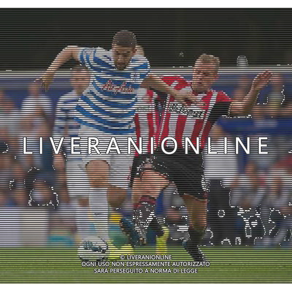 Queens Park Rangers\' Adel Taarabt is tackled by Sunderland\'s Lee Cattermole Photographer Ashley Western/CameraSport Football - Barclays Premiership - Queens Park Rangers v Sunderland - Saturday 30th August 2014 - Loftus Road - London © CameraSport - 43 Linden Ave. Countesthorpe. Leicester. England. LE8 5PG - Tel: +44 (0) 116 277 4147 - admin@camerasport.com - www.camerasport.com ag aldo liverani sas only italy