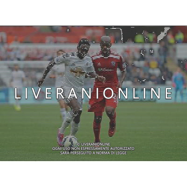 Swansea City\'s Nathan Dyer battles with West Bromwich Albion\'s Youssuf Mulumbu Photographer Ian Cook/CameraSport Football - Swansea City v West Bromwich Albion - Barclays Premiership - Saturday 30th August 2014 - Liberty Swansea - Swansea © CameraSport - 43 Linden Ave. Countesthorpe. Leicester. England. LE8 5PG - Tel: +44 (0) 116 277 4147 - admin@camerasport.com - www.camerasport.com AG ALDO LIVERANI SAS ONLY ITALY