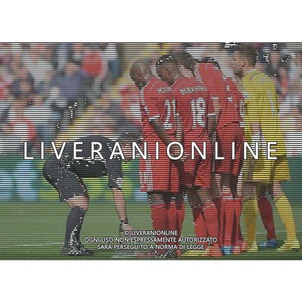 Referee Paul Tierney uses the spray during a free kick to Swansea Photographer Ian Cook/CameraSport Football - Swansea City v West Bromwich Albion - Barclays Premiership - Saturday 30th August 2014 - Liberty Swansea - Swansea © CameraSport - 43 Linden Ave. Countesthorpe. Leicester. England. LE8 5PG - Tel: +44 (0) 116 277 4147 - admin@camerasport.com - www.camerasport.com AG ALDO LIVERANI SAS ONLY ITALY