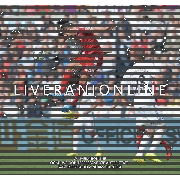 West Bromwich Albion\'s Craig Dawson and Swansea City\'s Wilfried Bony challenge for the header Photographer Ian Cook/CameraSport Football - Swansea City v West Bromwich Albion - Barclays Premiership - Saturday 30th August 2014 - Liberty Swansea - Swansea © CameraSport - 43 Linden Ave. Countesthorpe. Leicester. England. LE8 5PG - Tel: +44 (0) 116 277 4147 - admin@camerasport.com - www.camerasport.com AG ALDO LIVERANI SAS ONLY ITALY