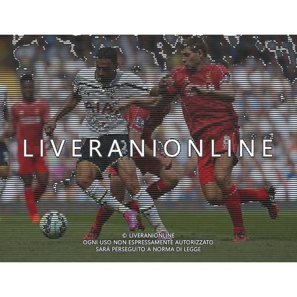 Tottenham Hotspur\'s Nacer Chadli despite the attentions of Liverpool\'s Steven Gerrard Photographer Kieran Galvin/CameraSport Football - Barclays Premiership - Tottenham Hotspur v Liverpool - Sunday 31st August 2014 - White Hart Lane - London © CameraSport - 43 Linden Ave. Countesthorpe. Leicester. England. LE8 5PG - Tel: +44 (0) 116 277 4147 - admin@camerasport.com - www.camerasport.com /Agenzia Aldo Liverani sas - ITALY ONLY - EDITORIAL USE ONLY