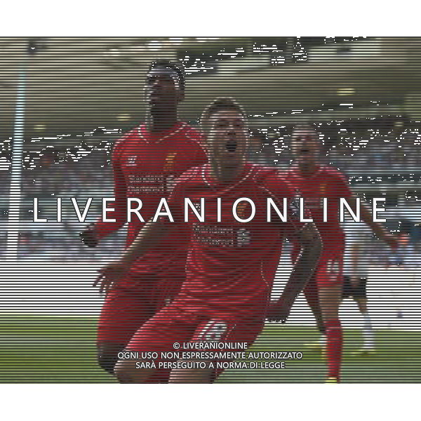 Liverpool\'s Alberto Moreno celebrates his goal Photographer Kieran Galvin/CameraSport Football - Barclays Premiership - Tottenham Hotspur v Liverpool - Sunday 31st August 2014 - White Hart Lane - London © CameraSport - 43 Linden Ave. Countesthorpe. Leicester. England. LE8 5PG - Tel: +44 (0) 116 277 4147 - admin@camerasport.com - www.camerasport.com /Agenzia Aldo Liverani sas - ITALY ONLY - EDITORIAL USE ONLY
