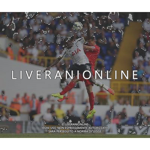 Tottenham Hotspur\'s Emmanuel Adebayor despite the attentions of Liverpool\'s Dejan Lovren Photographer Kieran Galvin/CameraSport Football - Barclays Premiership - Tottenham Hotspur v Liverpool - Sunday 31st August 2014 - White Hart Lane - London © CameraSport - 43 Linden Ave. Countesthorpe. Leicester. England. LE8 5PG - Tel: +44 (0) 116 277 4147 - admin@camerasport.com - www.camerasport.com /Agenzia Aldo Liverani sas - ITALY ONLY - EDITORIAL USE ONLY