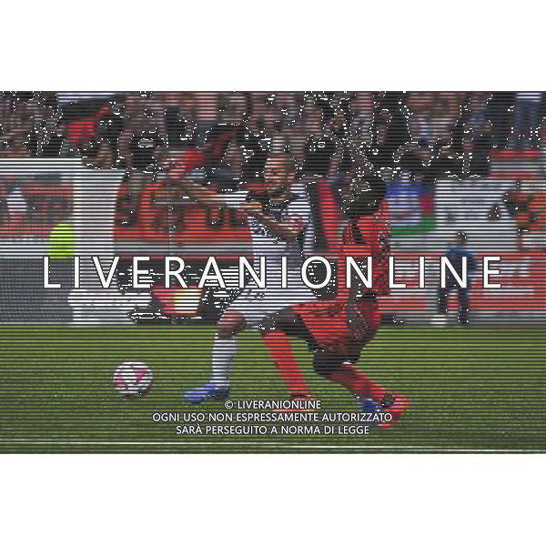 Lionel Mathis / Gilles Sunu - 30.08.2014 - Lorient / Guingamp - 4eme journee Ligue 1 Photo : Philippe Le Brech / Icon Sport AG ALDO LIVERANI SAS ONLY ITALY