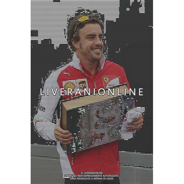 Fernando Alonso (ESP) Ferrari with a large book. 04.09.2014. Formula 1 World Championship, Rd 13, Italian Grand Prix, Monza, Italy, Preparation Day. AG ALDO LIVERANI SAS ONLY ITALY