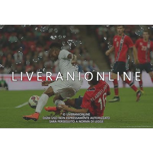 Norway\'s Havard Nordtveit brings down England\'s Raheem Sterling Photographer Kieran Galvin/CameraSport International Football Friendly - England v Norway - Wednesday 3rd September 2014 - Wembley - London © CameraSport - 43 Linden Ave. Countesthorpe. Leicester. England. LE8 5PG - Tel: +44 (0) 116 277 4147 - admin@camerasport.com - www.camerasport.com /AGENZIA ALDO LIVERANI SAS - ITALY ONLY - INGHILTERRA - NORVEGIA PARTITA CALCIO AMICHEVOLE INTERNAZIONALE