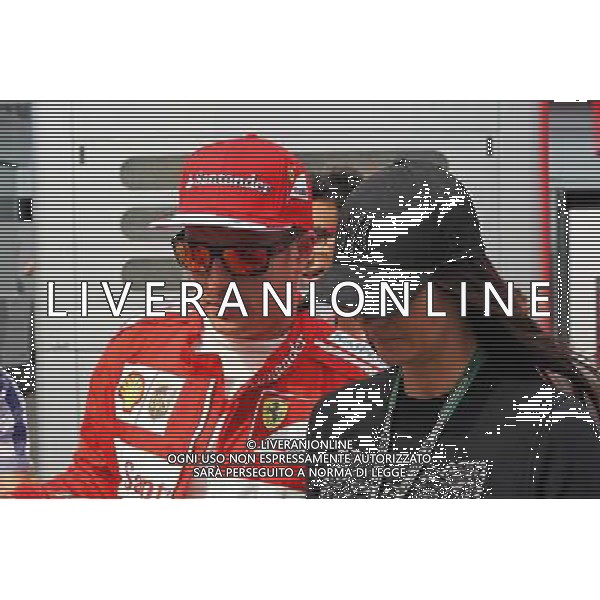 Kimi Raikkonen (FIN) Ferrari with his girlfriend Minttu Virtanen (FIN). 05.09.2014. Formula 1 World Championship, Rd 13, Italian Grand Prix, Monza, Italy, Practice Day. AG ALDO LIVERANI SAS ONLY ITALY