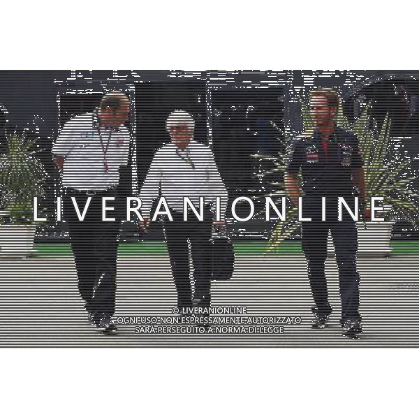 (L to R): Bruno Michel (FRA) GP2 CEO with Bernie Ecclestone (GBR) and Christian Horner (GBR) Red Bull Racing Team Principal. 05.09.2014. Formula 1 World Championship, Rd 13, Italian Grand Prix, Monza, Italy, Practice Day. AG ALDO LIVERANI SAS ONLY ITALY