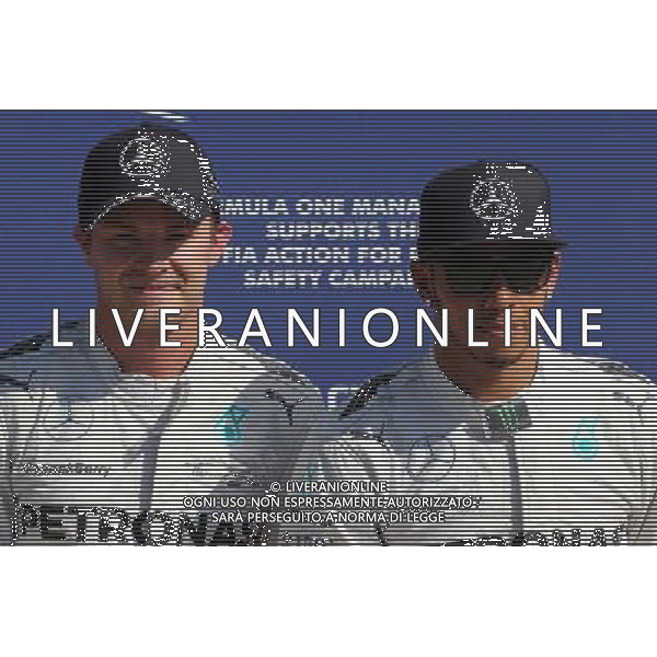 Lewis Hamilton (GBR), Mercedes AMG F1 Team and Nico Rosberg (GER), Mercedes AMG F1 Team 06.09.2014. Formula 1 World Championship, Rd 13, Italian Grand Prix, Monza, Italy, Qualifying Day. - www.xpbimages.com, EMail: requests@xpbimages.com - copy of publication required for printed pictures. Every used picture is fee-liable. © Copyright: Charniaux / XPB Images /AGENZIA ALDO LIVERANI SAS - ITALY ONLY - Gp F1 Monza italia prove ufficiali