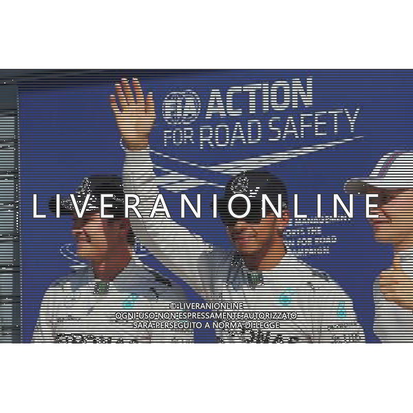 Qualifying top three in parc ferme (L to R): Nico Rosberg (GER) Mercedes AMG F1, second; Lewis Hamilton (GBR) Mercedes AMG F1, pole position; Valtteri Bottas (FIN) Williams, third. 06.09.2014. Formula 1 World Championship, Rd 13, Italian Grand Prix, Monza, Italy, Qualifying Day. - www.xpbimages.com, EMail: requests@xpbimages.com - copy of publication required for printed pictures. Every used picture is fee-liable. © Copyright: Moy / XPB Images /AGENZIA ALDO LIVERANI SAS - ITALY ONLY - Gp F1 Monza italia prove ufficiali