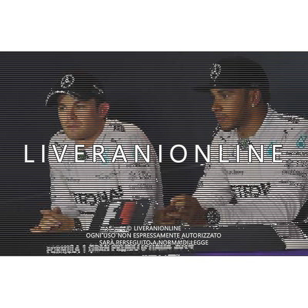 (L to R): Nico Rosberg (GER) Mercedes AMG F1 with team mate Lewis Hamilton (GBR) Mercedes AMG F1 in the post qualifying FIA Press Conference. 06.09.2014. Formula 1 World Championship, Rd 13, Italian Grand Prix, Monza, Italy, Qualifying Day. - www.xpbimages.com, EMail: requests@xpbimages.com - copy of publication required for printed pictures. Every used picture is fee-liable. © Copyright: Moy / XPB Images /AGENZIA ALDO LIVERANI SAS - ITALY ONLY - Gp F1 Monza italia prove ufficiali