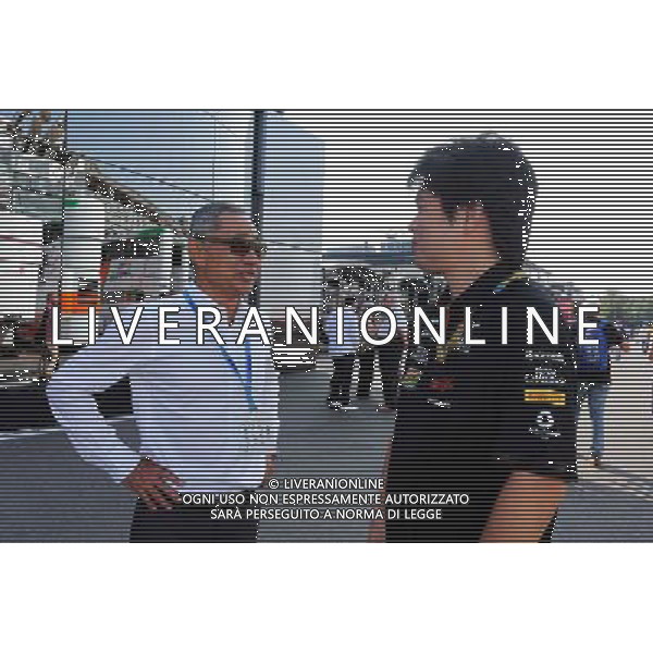 (L to R): Hiroshi Yasukawa (JPN) Dorna Sports Adviser with Jun Matsuzaki (JPN) Sahara Force India F1 Team Senior Tyre Engineer. 07.09.2014. Formula 1 World Championship, Rd 13, Italian Grand Prix, Monza, Italy, Race Day. - www.xpbimages.com, EMail: requests@xpbimages.com - copy of publication required for printed pictures. Every used picture is fee-liable. © Copyright: Moy / XPB Images /AGENZIA ALDO LIVERANI SAS - ITALY ONLY - Gp F1 Monza italia Gara