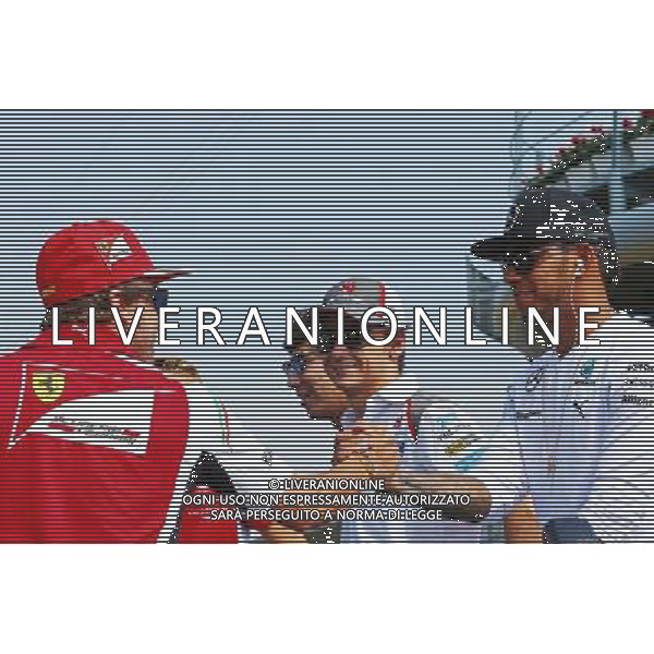(L to R): Fernando Alonso (ESP) Ferrari with Lewis Hamilton (GBR) Mercedes AMG F1 on the drivers parade. 07.09.2014. Formula 1 World Championship, Rd 13, Italian Grand Prix, Monza, Italy, Race Day. - www.xpbimages.com, EMail: requests@xpbimages.com - copy of publication required for printed pictures. Every used picture is fee-liable. © Copyright: Batchelor / XPB Images /AGENZIA ALDO LIVERANI SAS - ITALY ONLY - Gp F1 Monza italia Gara