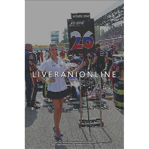 Grid girl for Daniil Kvyat (RUS) Scuderia Toro Rosso STR9. 07.09.2014. Formula 1 World Championship, Rd 13, Italian Grand Prix, Monza, Italy, Race Day. - www.xpbimages.com, EMail: requests@xpbimages.com - copy of publication required for printed pictures. Every used picture is fee-liable. © Copyright: Batchelor / XPB Images /AGENZIA ALDO LIVERANI SAS - ITALY ONLY - Gp F1 Monza italia Gara