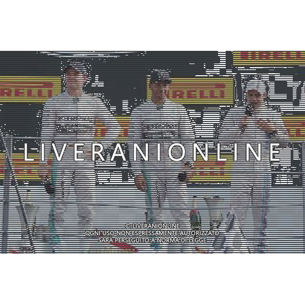 The podium (L to R): Nico Rosberg (GER) Mercedes AMG F1, second; Lewis Hamilton (GBR) Mercedes AMG F1, race winner; Felipe Massa (BRA) Williams, third. 07.09.2014. Formula 1 World Championship, Rd 13, Italian Grand Prix, Monza, Italy, Race Day. - www.xpbimages.com, EMail: requests@xpbimages.com - copy of publication required for printed pictures. Every used picture is fee-liable. © Copyright: Moy / XPB Images /AGENZIA ALDO LIVERANI SAS - ITALY ONLY - Gp F1 Monza italia Gara