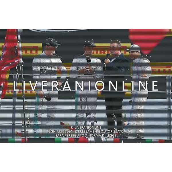 The podium (L to R): Nico Rosberg (GER) Mercedes AMG F1, second; Lewis Hamilton (GBR) Mercedes AMG F1, race winner; Jean Alesi (FRA); Felipe Massa (BRA) Williams, third. 07.09.2014. Formula 1 World Championship, Rd 13, Italian Grand Prix, Monza, Italy, Race Day. - www.xpbimages.com, EMail: requests@xpbimages.com - copy of publication required for printed pictures. Every used picture is fee-liable. © Copyright: Moy / XPB Images /AGENZIA ALDO LIVERANI SAS - ITALY ONLY - Gp F1 Monza italia Gara