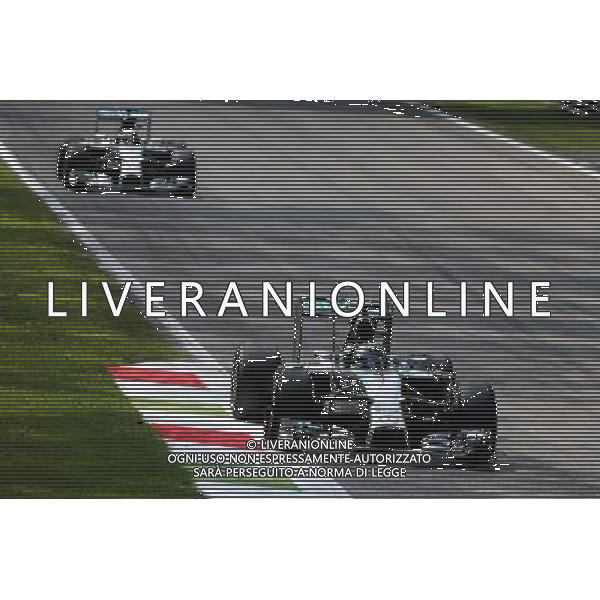 Nico Rosberg (GER), Mercedes AMG F1 Team and Lewis Hamilton (GBR), Mercedes AMG F1 Team 07.09.2014. Formula 1 World Championship, Rd 13, Italian Grand Prix, Monza, Italy, Race Day. - www.xpbimages.com, EMail: requests@xpbimages.com - copy of publication required for printed pictures. Every used picture is fee-liable. © Copyright: Charniaux / XPB Images /AGENZIA ALDO LIVERANI SAS - ITALY ONLY - Gp F1 Monza italia Gara
