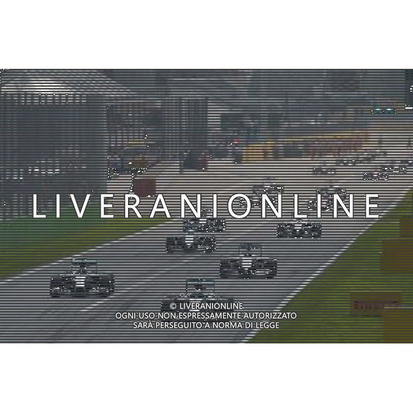 Lewis Hamilton (GBR) Mercedes AMG F1 W05 leads on the formation lap. 07.09.2014. Formula 1 World Championship, Rd 13, Italian Grand Prix, Monza, Italy, Race Day. AG ALDO LIVERANI SAS ONLY ITALY