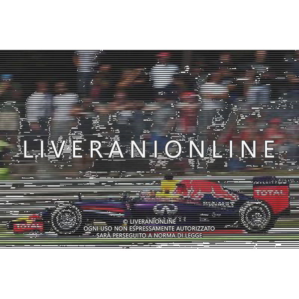 Sebastian Vettel (GER) Red Bull Racing RB10. 07.09.2014. Formula 1 World Championship, Rd 13, Italian Grand Prix, Monza, Italy, Race Day. AG ALDO LIVERANI SAS ONLY ITALY