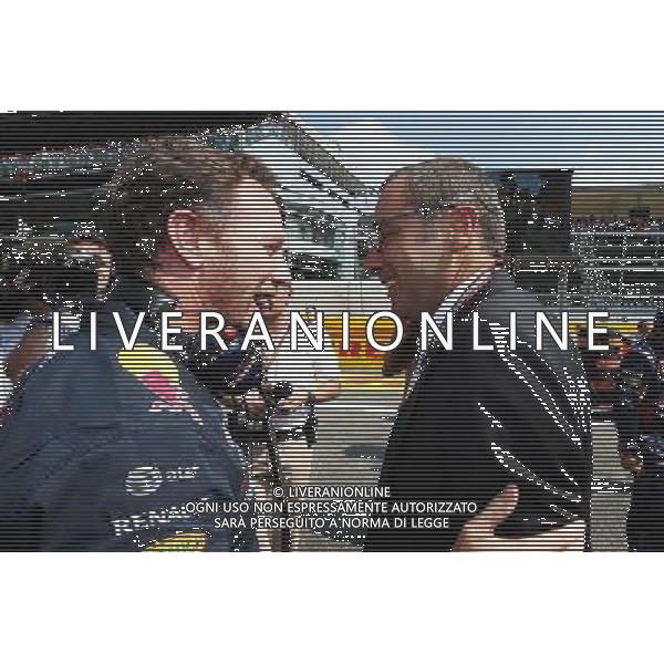 (L to R): Christian Horner (GBR) Red Bull Racing Team Principal with Stefano Domenicali (ITA) on the grid. 07.09.2014. Formula 1 World Championship, Rd 13, Italian Grand Prix, Monza, Italy, Race Day. AG ALDO LIVERANI SAS ONLY ITALY