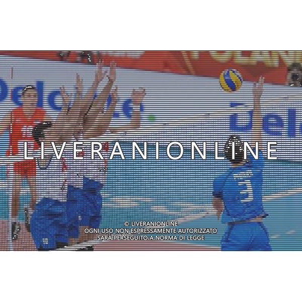 10.09.2014 - Lodz , Atlas Arena , siatkowka , Mistrzostwa Swiata 2014 , grupa E Serbia (biale) - Wlochy (niebieskie) , FIVB Men\'s World Championship , pool A Serbia (white) - Italy (blue) N/Z Milos Nikic , Srecko Lisinac , Aleksandar Atanasijevic , Simone Parodi Fot. Mariusz Palczynski / MPAimages.com / NEWSPIX.PL --- Newspix.pl AG ALDO LIVERANI SAS ONLY ITALY *** Local Caption *** www.newspix.pl mail us: info@newspix.pl call us: 0048 022 23 22 222 --- Polish Picture Agency by Ringier Axel Springer Poland