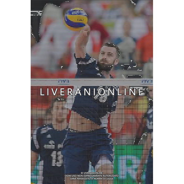 13.09.2014 - Lodz , Atlas Arena , siatkowka , Mistrzostwa Swiata 2014 , grupa E Polska (granatowe) - Iran (czerwone) , FIVB Men\'s World Championship , pool E Poland (navy) - Iran (red) N/Z Marcin Mozdzonek Fot. Mariusz Palczynski / MPAimages.com / NEWSPIX.PL --- Newspix.pl AG ALDO LIVERANI SAS ONLY ITALY *** Local Caption *** www.newspix.pl mail us: info@newspix.pl call us: 0048 022 23 22 222 --- Polish Picture Agency by Ringier Axel Springer Poland