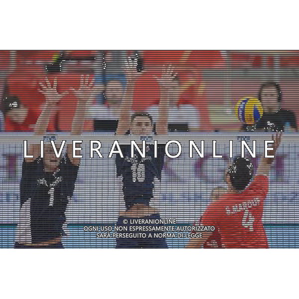 13.09.2014 - Lodz , Atlas Arena , siatkowka , Mistrzostwa Swiata 2014 , grupa E Polska (granatowe) - Iran (czerwone) , FIVB Men\'s World Championship , pool E Poland (navy) - Iran (red) N/Z Piotr Nowakowski , Mariusz Wlazly , Mir Saeid Marouflakrani Fot. Mariusz Palczynski / MPAimages.com / NEWSPIX.PL --- Newspix.pl AG ALDO LIVERANI SAS ONLY ITALY *** Local Caption *** www.newspix.pl mail us: info@newspix.pl call us: 0048 022 23 22 222 --- Polish Picture Agency by Ringier Axel Springer Poland