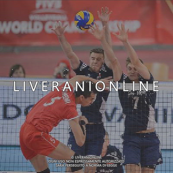 13.09.2014 - Lodz , Atlas Arena , siatkowka , Mistrzostwa Swiata 2014 , grupa E Polska (granatowe) - Iran (czerwone) , FIVB Men\'s World Championship , pool E Poland (navy) - Iran (red) N/Z Farhad Ghaemi , Mariusz Wlazly , Piotr Nowakowski Fot. Mariusz Palczynski / MPAimages.com / NEWSPIX.PL --- Newspix.pl AG ALDO LIVERANI SAS ONLY ITALY *** Local Caption *** www.newspix.pl mail us: info@newspix.pl call us: 0048 022 23 22 222 --- Polish Picture Agency by Ringier Axel Springer Poland