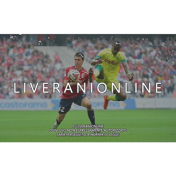 Sebastien CORCHIA / Serge GAKPE - 14.09.2014 - Lille / Nantes - 5eme journee de Ligue 1 Photo : Dave Winter / Icon Sport AG ALDO LIVERANI SAS ONLY ITALY