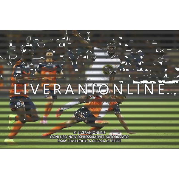 Gilles SUNU / Abdelhamid EL KAOUTARI - 13.09.2014 - Montpellier / Lorient - 5eme journee Ligue 1 Photo : Nicolas Guyonnet / Icon Sport /Agenzia Aldo Liverani sas - ITALY ONLY - EDITORIAL USE ONLY