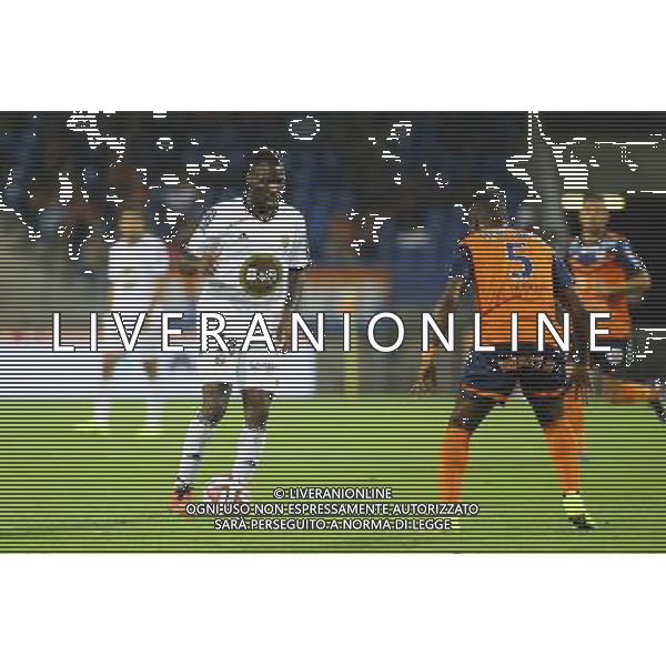 Gilles SUNU / Siaka Chico TIENE - 13.09.2014 - Montpellier / Lorient - 5eme journee Ligue 1 Photo : Nicolas Guyonnet / Icon Sport /Agenzia Aldo Liverani sas - ITALY ONLY - EDITORIAL USE ONLY