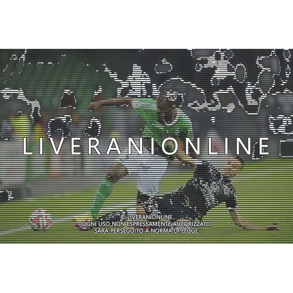 Kevin MONNET PAQUET / Florian RASPENTINO - 13.09.2014 - Saint Etienne / Caen - 5eme journee Ligue 1 Photo : Jean Paul Thomas / Icon Sport /Agenzia Aldo Liverani sas - ITALY ONLY - EDITORIAL USE ONLY