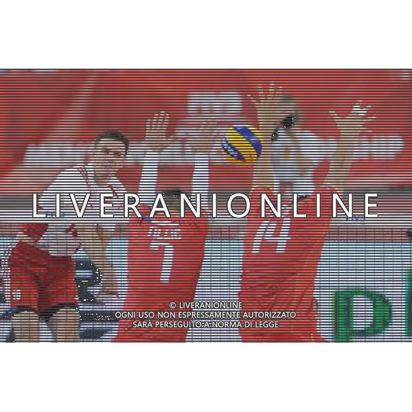 14.09.2014 - Lodz , Atlas Arena , siatkowka , Mistrzostwa Swiata 2014 , grupa E Polska (biale) - Francja (czerwone) , FIVB Men\'s World Championship , pool E Poland (white) - France (red) N/Z Mariusz Wlazly , Kevin Tillie , Nicolas Le Goff Fot. Mariusz Palczynski / MPAimages.com / NEWSPIX.PL --- Newspix.pl /Agenzia Aldo Liverani sas - ITALY ONLY - Polonia - Francia Campionati Mondiali Volley maschile FIVB pallavolo Polonia 2014 *** Local Caption *** www.newspix.pl mail us: info@newspix.pl call us: 0048 022 23 22 222 --- Polish Picture Agency by Ringier Axel Springer Poland