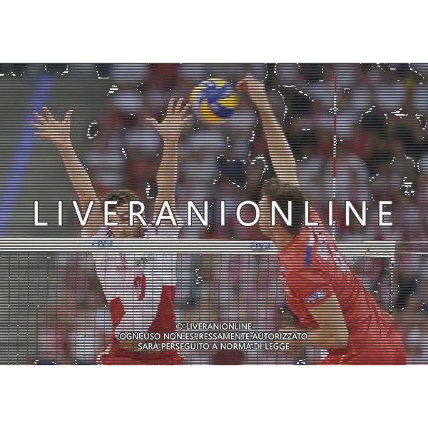 2014.09.14 LODZ VOLLEYBALL MEN\'S CHAMPIONSHIP POLAND 2014 SECOND ROUND POOL E POLAND VS FRANCE MATEUSZ MIKA ANTONIN ROUZIER 2014.09.14 LODZ SIATKOWKA MEZCZYZN MISTRZOSTWA SWIATA POLSKA 2014 RUNDA PIERWSZA GRUPA E POLSKA - FRANCJA N/Z MATEUSZ MIKA ANTONIN ROUZIER FOTO LUKASZ LASKOWSKI / PRESSFOCUS / NEWSPIX.PL --- Newspix.pl /Agenzia Aldo Liverani sas - ITALY ONLY - Polonia - Francia Campionati Mondiali Volley maschile FIVB pallavolo Polonia 2014 *** Local Caption *** www.newspix.pl mail us: info@newspix.pl call us: 0048 022 23 22 222 --- Polish Picture Agency by Ringier Axel Springer Poland