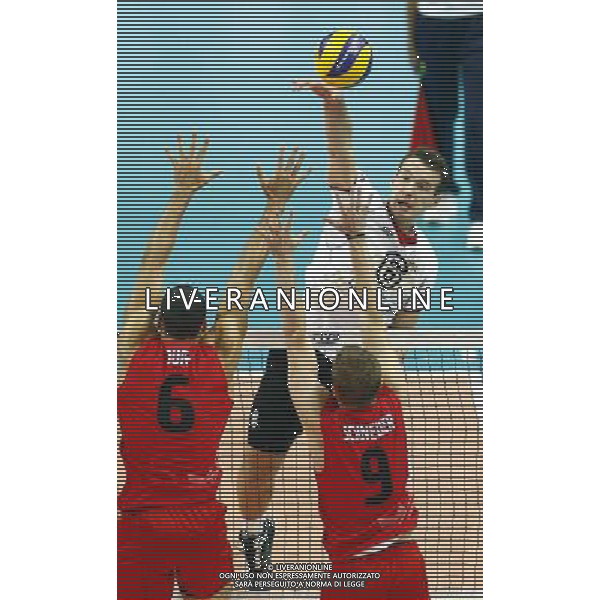 14.09.2014 - Katowice , Mistrzostwa Swiata . POLAND, FIVB Volleyball Men\'s World Championship 2014 . Niemcy (bialo-czarne - Kanada (czerwone) n/z. Denys Kaliberda . Fot. Tomasz Wantula / EDYTOR.net / NEWSPIX.PL --- Newspix.pl /Agenzia Aldo Liverani sas - ITALY ONLY - Germania - Canada Campionati Mondiali Volley maschile FIVB pallavolo Polonia 2014 *** Local Caption *** www.newspix.pl mail us: info@newspix.pl call us: 0048 022 23 22 222 --- Polish Picture Agency by Ringier Axel Springer Poland