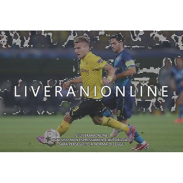 Fu§ball, firo : 16.09.2014 Uefa Champions League, Saison 2014/2015, Gruppenphase BVB, Borussia Dortmund, Arsenal London, Zweikampf, Ciro IMMOBILE, BVB Borussia Dortmund, Mikel Arteta, Arsenal London, ganze Figur, $worldrightsEs gelten unsere AGB, einsehbar auf www.firosportphoto.de, copyright by firo sportphoto: Coesfelder Str. 207 D-48249 DŸlmen www.firosportphoto.de mail@firosportphoto.de (V o l k s b a n k B o c h u m - W i t t e n ) BLZ.: 430 601 29 Kt. Nr.: 341 117 100 Tel:Ê +49-2594-9916004 Fax:Ê+49-2594-9916005 AG ALDO LIVERANI SAS ONLY ITALY