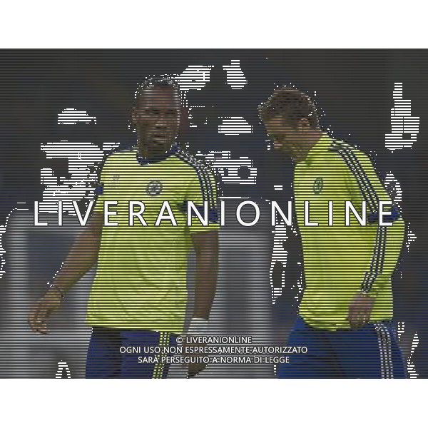Chelsea\'s Didier Drogba during the pre-match warm-up with Nemanja Matic Photographer Ashley Western/CameraSport Football - UEFA Champions League Group G - Chelsea v Schalke - Wednesday 17th September 2014 - Stamford Bridge - London © CameraSport - 43 Linden Ave. Countesthorpe. Leicester. England. LE8 5PG - Tel: +44 (0) 116 277 4147 - admin@camerasport.com - www.camerasport.com /Agenzia Aldo Liverani sas - ITALY ONLY - EDITORIAL USE ONLY
