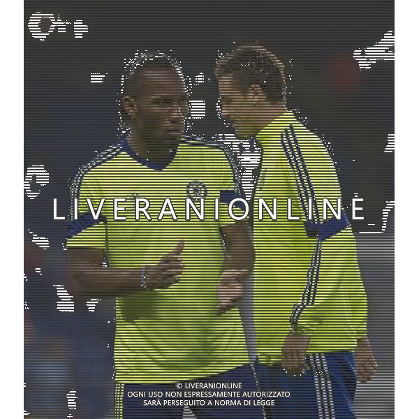 Chelsea\'s Didier Drogba during the pre-match warm-up with Nemanja Matic Photographer Ashley Western/CameraSport Football - UEFA Champions League Group G - Chelsea v Schalke - Wednesday 17th September 2014 - Stamford Bridge - London © CameraSport - 43 Linden Ave. Countesthorpe. Leicester. England. LE8 5PG - Tel: +44 (0) 116 277 4147 - admin@camerasport.com - www.camerasport.com /Agenzia Aldo Liverani sas - ITALY ONLY - EDITORIAL USE ONLY