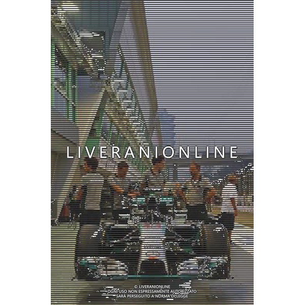 Mercedes AMG F1 W05 in the pits. 18.09.2014. Formula 1 World Championship, Rd 14, Singapore Grand Prix, Singapore, Singapore, Preparation Day. - www.xpbimages.com, EMail: requests@xpbimages.com - copy of publication required for printed pictures. Every used picture is fee-liable. © Copyright: Batchelor / XPB Images /Agenzia Aldo Liverani sas - ITALY ONLY - EDITORIAL USE ONLY