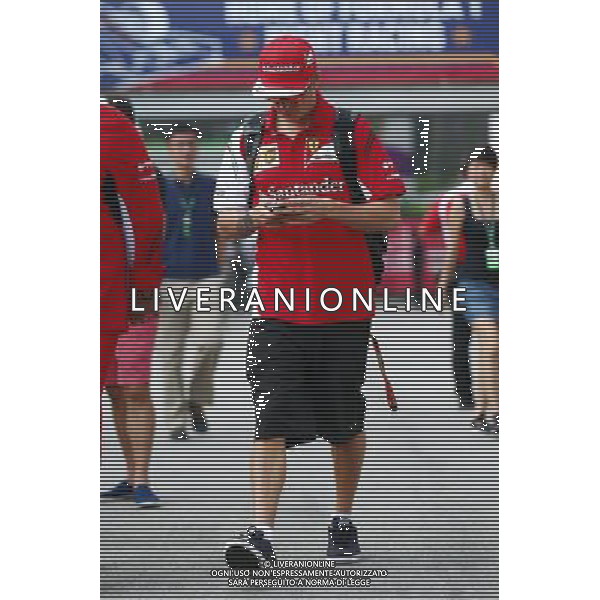 Kimi Raikkonen (FIN) Ferrari. 19.09.2014. Formula 1 World Championship, Rd 14, Singapore Grand Prix, Singapore, Singapore, Practice Day. - www.xpbimages.com, EMail: requests@xpbimages.com - copy of publication required for printed pictures. Every used picture is fee-liable. © Copyright: Batchelor / XPB Images /Agenzia Aldo Liverani sas - ITALY ONLY - EDITORIAL USE ONLY - PROVE LIBERE
