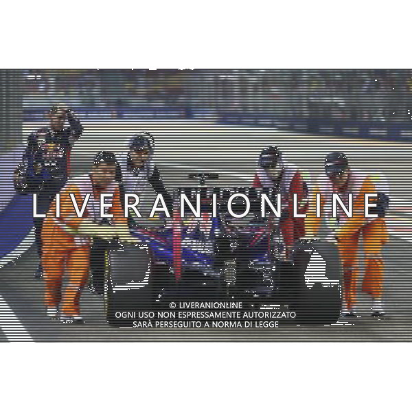 Sebastian Vettel (GER) Red Bull Racing RB10 stops at the end of FP1. 19.09.2014. Formula 1 World Championship, Rd 14, Singapore Grand Prix, Singapore, Singapore, Practice Day. - www.xpbimages.com, EMail: requests@xpbimages.com - copy of publication required for printed pictures. Every used picture is fee-liable. © Copyright: Batchelor / XPB Images /Agenzia Aldo Liverani sas - ITALY ONLY - EDITORIAL USE ONLY - PROVE LIBERE