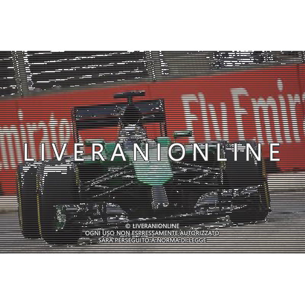 Kamui Kobayashi (JPN) Caterham CT05. 19.09.2014. Formula 1 World Championship, Rd 14, Singapore Grand Prix, Singapore, Singapore, Practice Day. - www.xpbimages.com, EMail: requests@xpbimages.com - copy of publication required for printed pictures. Every used picture is fee-liable. © Copyright: Photo4 / XPB Images /Agenzia Aldo Liverani sas - ITALY ONLY - EDITORIAL USE ONLY - PROVE LIBERE