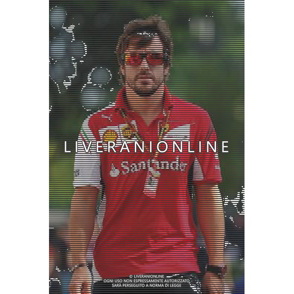 Fernando Alonso (ESP) Ferrari. 19.09.2014. Formula 1 World Championship, Rd 14, Singapore Grand Prix, Singapore, Singapore, Practice Day. - www.xpbimages.com, EMail: requests@xpbimages.com - copy of publication required for printed pictures. Every used picture is fee-liable. © Copyright: Price / XPB Images /Agenzia Aldo Liverani sas - ITALY ONLY - EDITORIAL USE ONLY - Gp F1 Singapore - Prove Libere