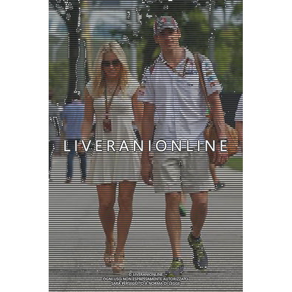 Adrian Sutil (GER) Sauber with his girlfriend Jennifer Becks (GER). 20.09.2014. Formula 1 World Championship, Rd 14, Singapore Grand Prix, Singapore, Singapore, Qualifying Day. - www.xpbimages.com, EMail: requests@xpbimages.com - copy of publication required for printed pictures. Every used picture is fee-liable. © Copyright: Batchelor / XPB Images /Agenzia Aldo Liverani sas - ITALY ONLY - EDITORIAL USE ONLY - Gp F1 Singapore - Prove di Qualifica