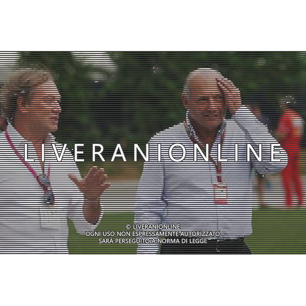 Ron Dennis (GBR) McLaren Executive Chairman (Right). 20.09.2014. Formula 1 World Championship, Rd 14, Singapore Grand Prix, Singapore, Singapore, Qualifying Day. - www.xpbimages.com, EMail: requests@xpbimages.com - copy of publication required for printed pictures. Every used picture is fee-liable. © Copyright: Photo4 / XPB Images /Agenzia Aldo Liverani sas - ITALY ONLY - EDITORIAL USE ONLY - Gp F1 Singapore - Prove di Qualifica