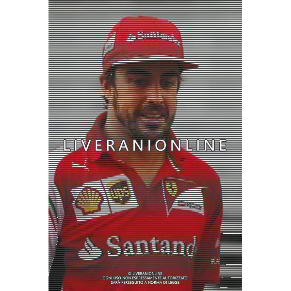 Fernando Alonso (ESP) Ferrari. 20.09.2014. Formula 1 World Championship, Rd 14, Singapore Grand Prix, Singapore, Singapore, Qualifying Day. - www.xpbimages.com, EMail: requests@xpbimages.com - copy of publication required for printed pictures. Every used picture is fee-liable. © Copyright: Batchelor / XPB Images /Agenzia Aldo Liverani sas - ITALY ONLY - EDITORIAL USE ONLY - Gp F1 Singapore - Prove di Qualifica