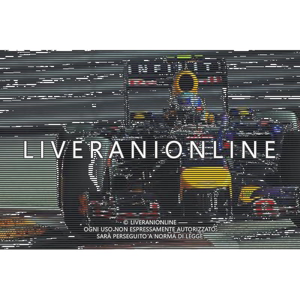 Daniel Ricciardo (AUS) Red Bull Racing RB10. 20.09.2014. Formula 1 World Championship, Rd 14, Singapore Grand Prix, Singapore, Singapore, Qualifying Day. - www.xpbimages.com, EMail: requests@xpbimages.com - copy of publication required for printed pictures. Every used picture is fee-liable. © Copyright: Price / XPB Images /Agenzia Aldo Liverani sas - ITALY ONLY - EDITORIAL USE ONLY - Gp F1 Singapore - Prove di Qualifica