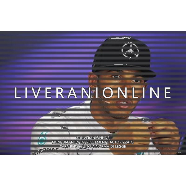 Lewis Hamilton (GBR) Mercedes AMG F1 in the FIA Press Conference. 20.09.2014. Formula 1 World Championship, Rd 14, Singapore Grand Prix, Singapore, Singapore, Qualifying Day. - www.xpbimages.com, EMail: requests@xpbimages.com - copy of publication required for printed pictures. Every used picture is fee-liable. © Copyright: Price / XPB Images /Agenzia Aldo Liverani sas - ITALY ONLY - EDITORIAL USE ONLY - Gp F1 Singapore - Prove di Qualifica