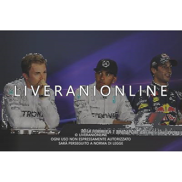The post qualifying FIA Press Conference (L to R): Nico Rosberg (GER) Mercedes AMG F1, second; Lewis Hamilton (GBR) Mercedes AMG F1, pole position; Daniel Ricciardo (AUS) Red Bull Racing, third. 20.09.2014. Formula 1 World Championship, Rd 14, Singapore Grand Prix, Singapore, Singapore, Qualifying Day. - www.xpbimages.com, EMail: requests@xpbimages.com - copy of publication required for printed pictures. Every used picture is fee-liable. © Copyright: Price / XPB Images /Agenzia Aldo Liverani sas - ITALY ONLY - EDITORIAL USE ONLY - Gp F1 Singapore - Prove di Qualifica