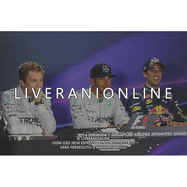 The post qualifying FIA Press Conference (L to R): Nico Rosberg (GER) Mercedes AMG F1, second; Lewis Hamilton (GBR) Mercedes AMG F1, pole position; Daniel Ricciardo (AUS) Red Bull Racing, third. 20.09.2014. Formula 1 World Championship, Rd 14, Singapore Grand Prix, Singapore, Singapore, Qualifying Day. - www.xpbimages.com, EMail: requests@xpbimages.com - copy of publication required for printed pictures. Every used picture is fee-liable. © Copyright: Price / XPB Images /Agenzia Aldo Liverani sas - ITALY ONLY - EDITORIAL USE ONLY - Gp F1 Singapore - Prove di Qualifica